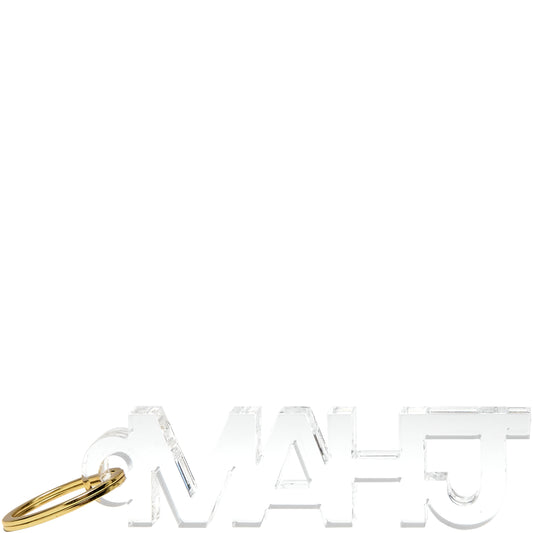 Clear MAHJ acrylic keychain with gold ring on a white background